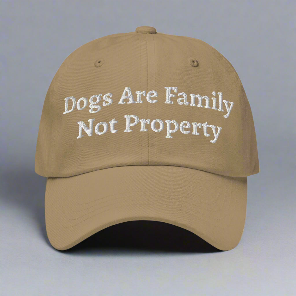 dogs are family beige cap