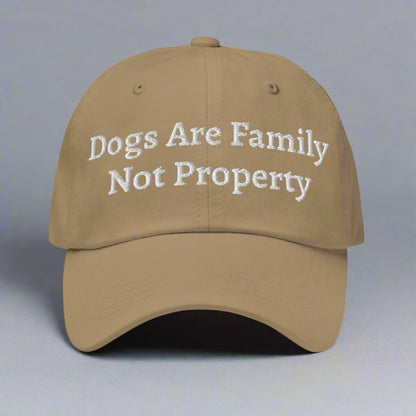 dogs are family beige cap