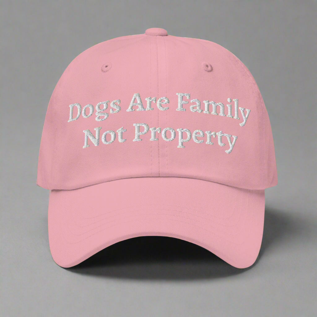 dogs are family pink cap