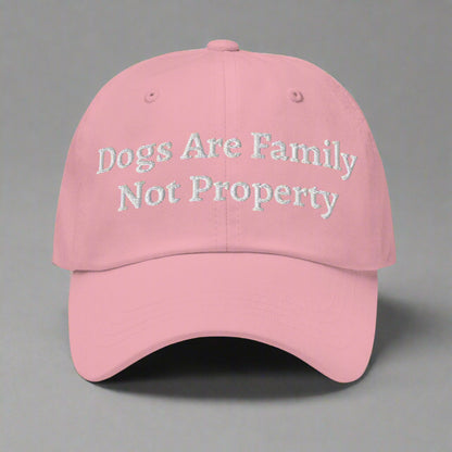 dogs are family pink cap
