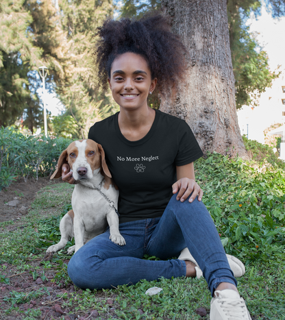 Woman sitting outdoors with a dog, wearing a black t-shirt with 'No More neger' text.