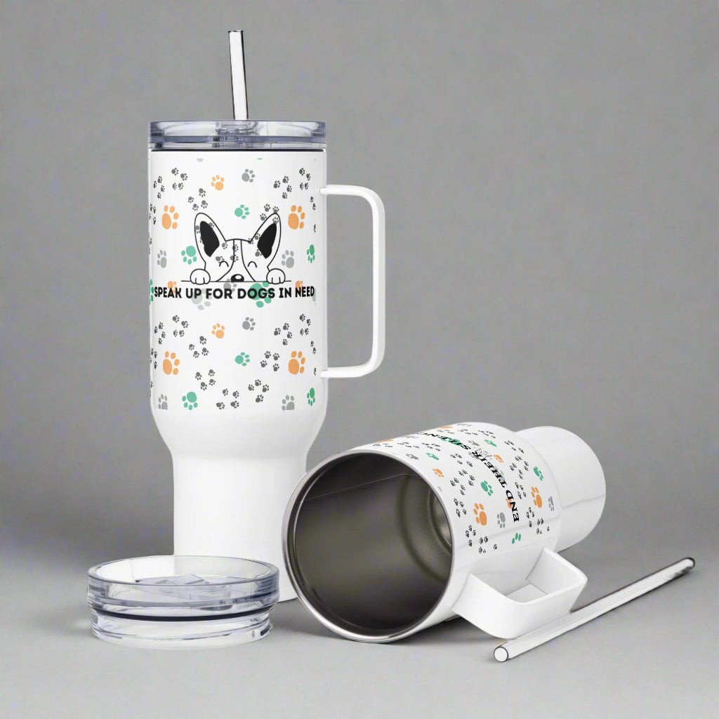 White insulated tumbler with handle and straw on a gray background