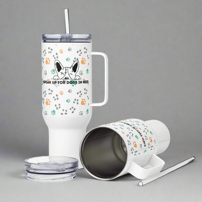 White insulated tumbler with handle and straw on a gray background