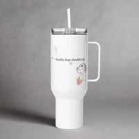White tumbler with handle and straw on a gray background