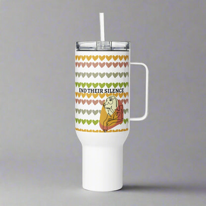 White tumbler with a heart pattern and a cartoon character on a gray background