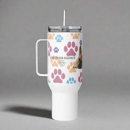 White tumbler with paw prints and a cat image on a gray background