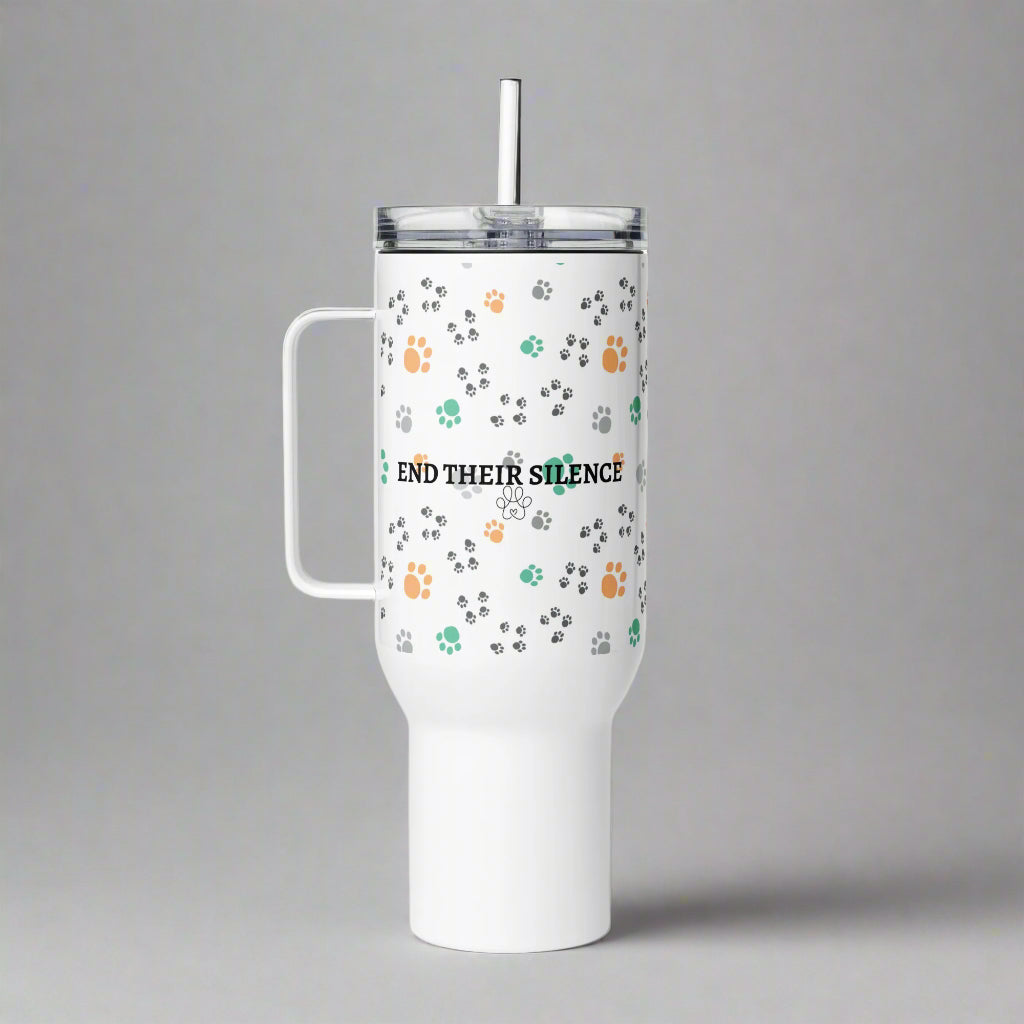 White tumbler with paw prints and text on a gray background