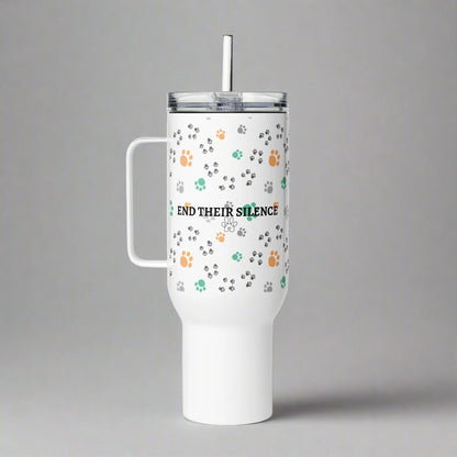 White tumbler with paw prints and text on a gray background