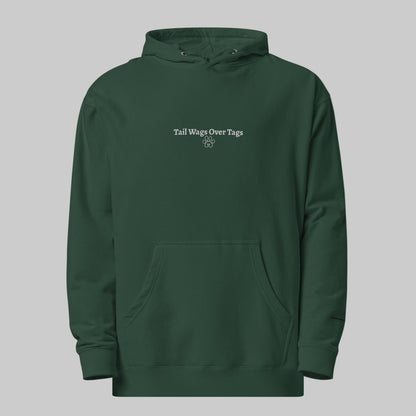 Green hoodie with 'Tail Wags Over Tags' text on a white background