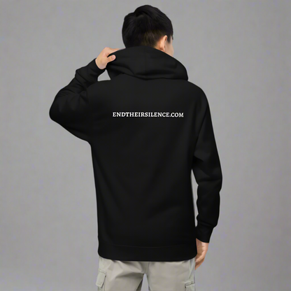 Person wearing a black hoodie with 'ENDTHEIRSILENCE.COM' text on the back against a gray background