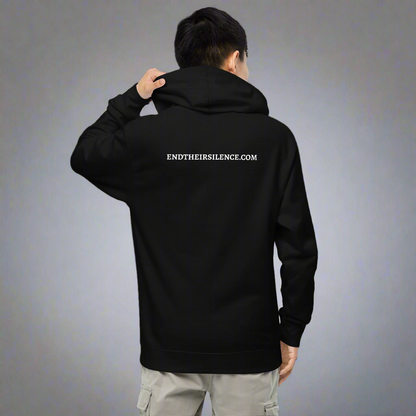 Person wearing a black hoodie with 'ENDTHEIRSILENCE.COM' text on the back against a gray background