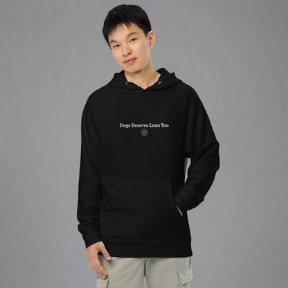 Person wearing a black hoodie with text on a white background