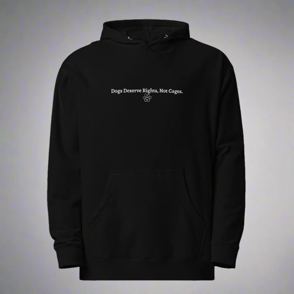 Black hoodie with text 'Dogs Deserve Rights, Not Cages' on a light gray background