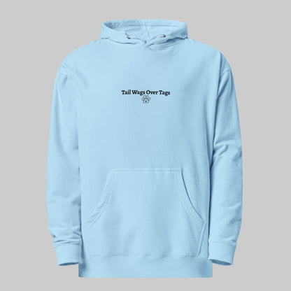 Light blue hoodie with text 'Tail Wags Over Tags' on a white background