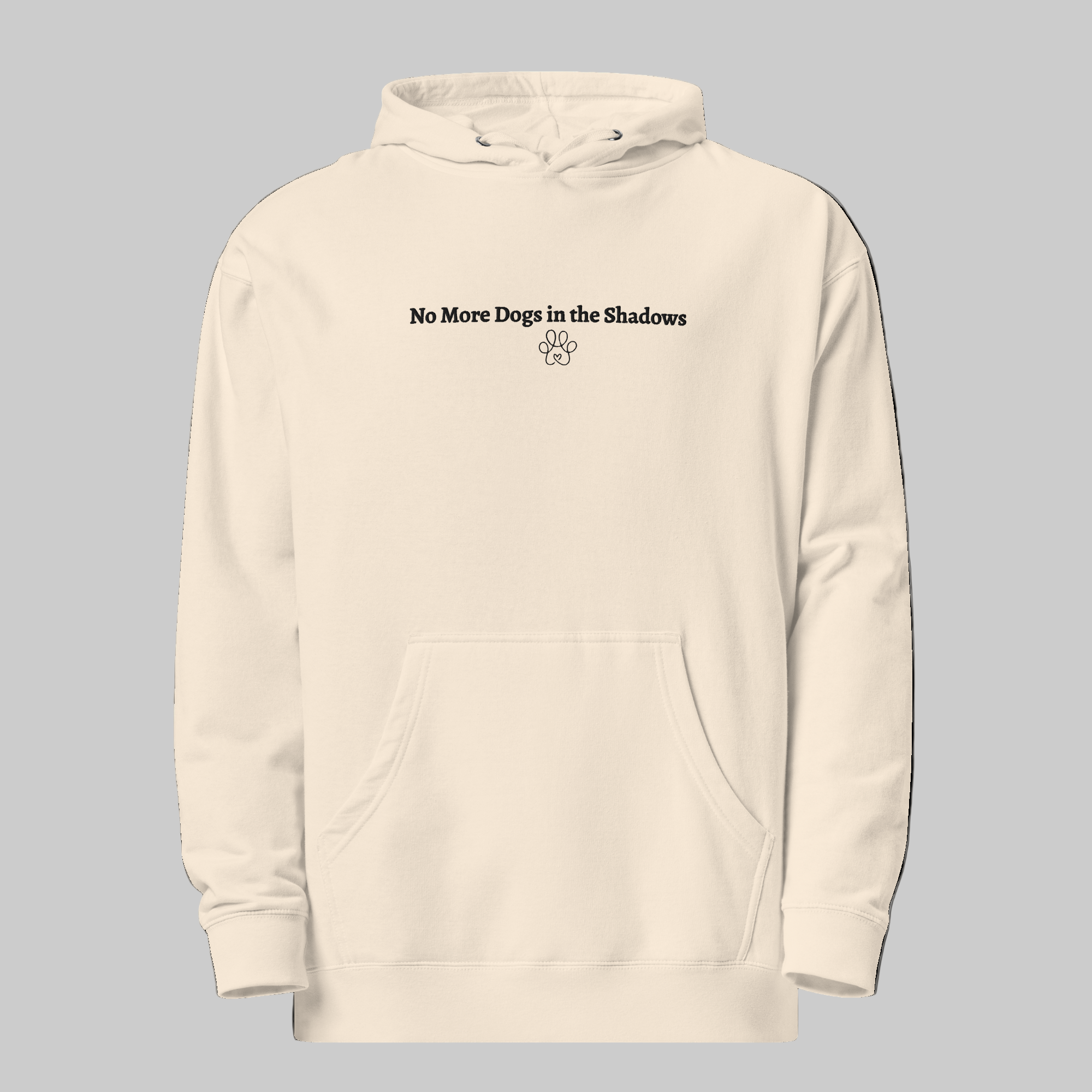 Beige hoodie with 'No More Dogs in the Shadows' text on a black background