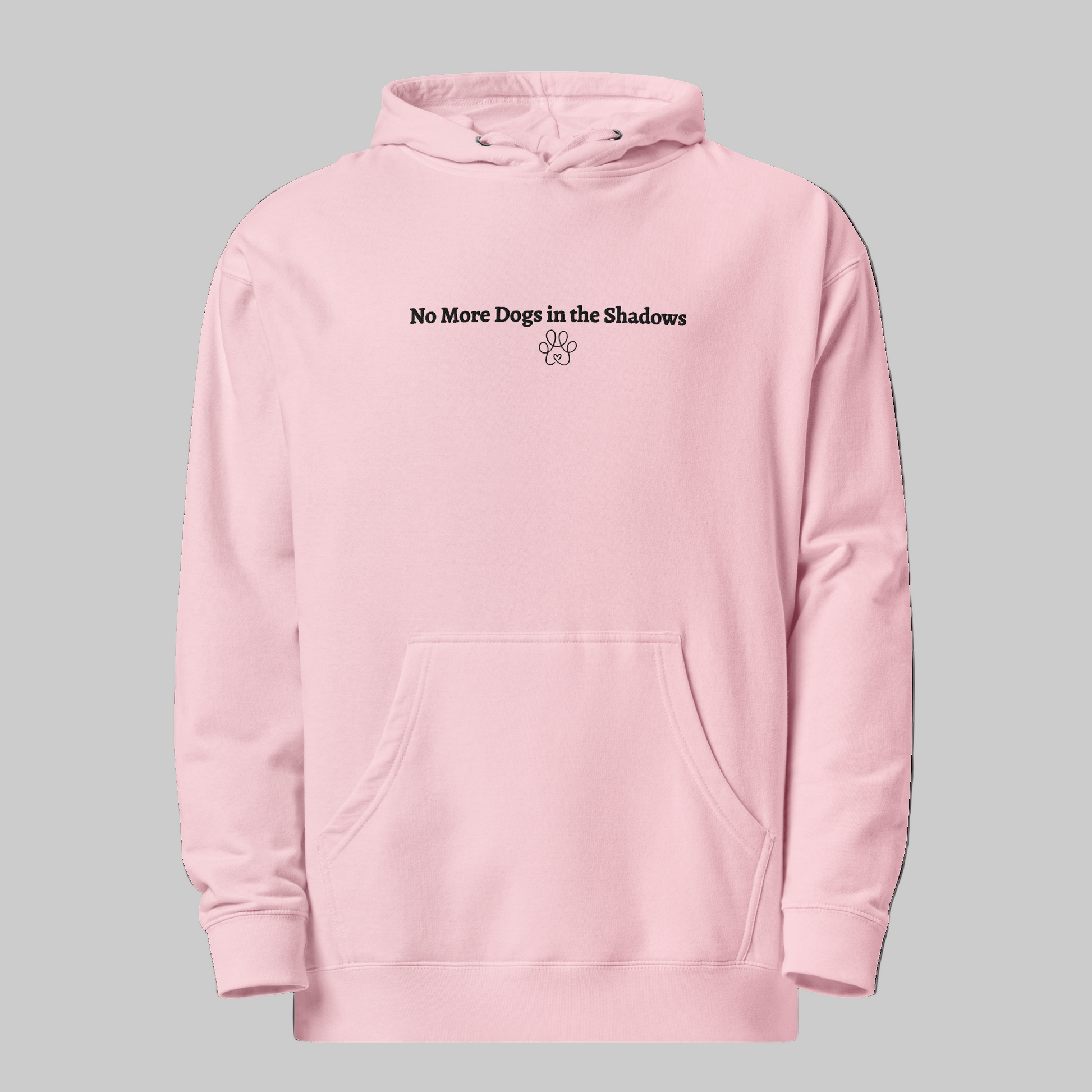Pink hoodie with 'No More Dogs in the Shadows' text on a black background