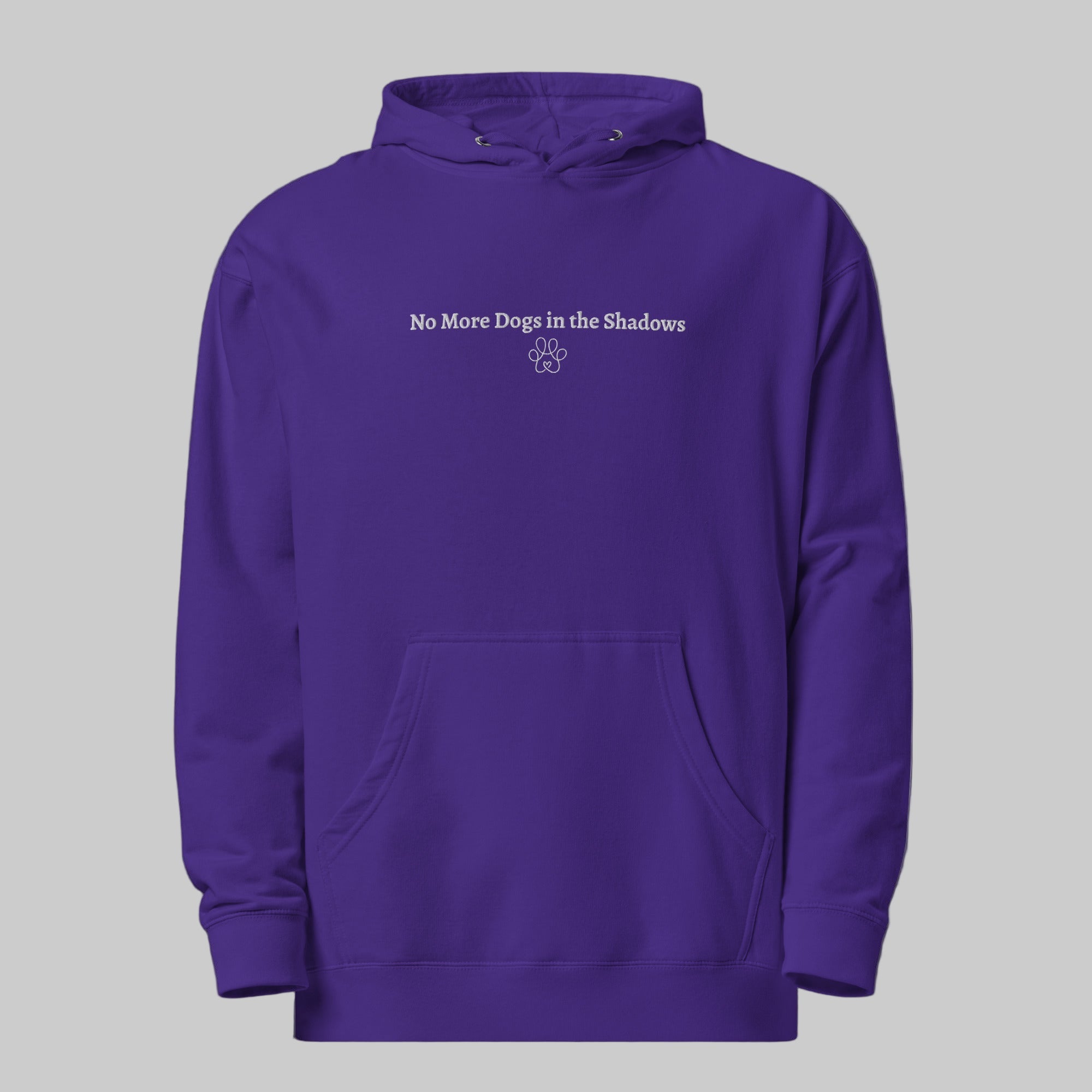 Purple hoodie with 'No More Dogs in the Shadows' text on a black background