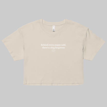 behind every puppy sold crop top off white